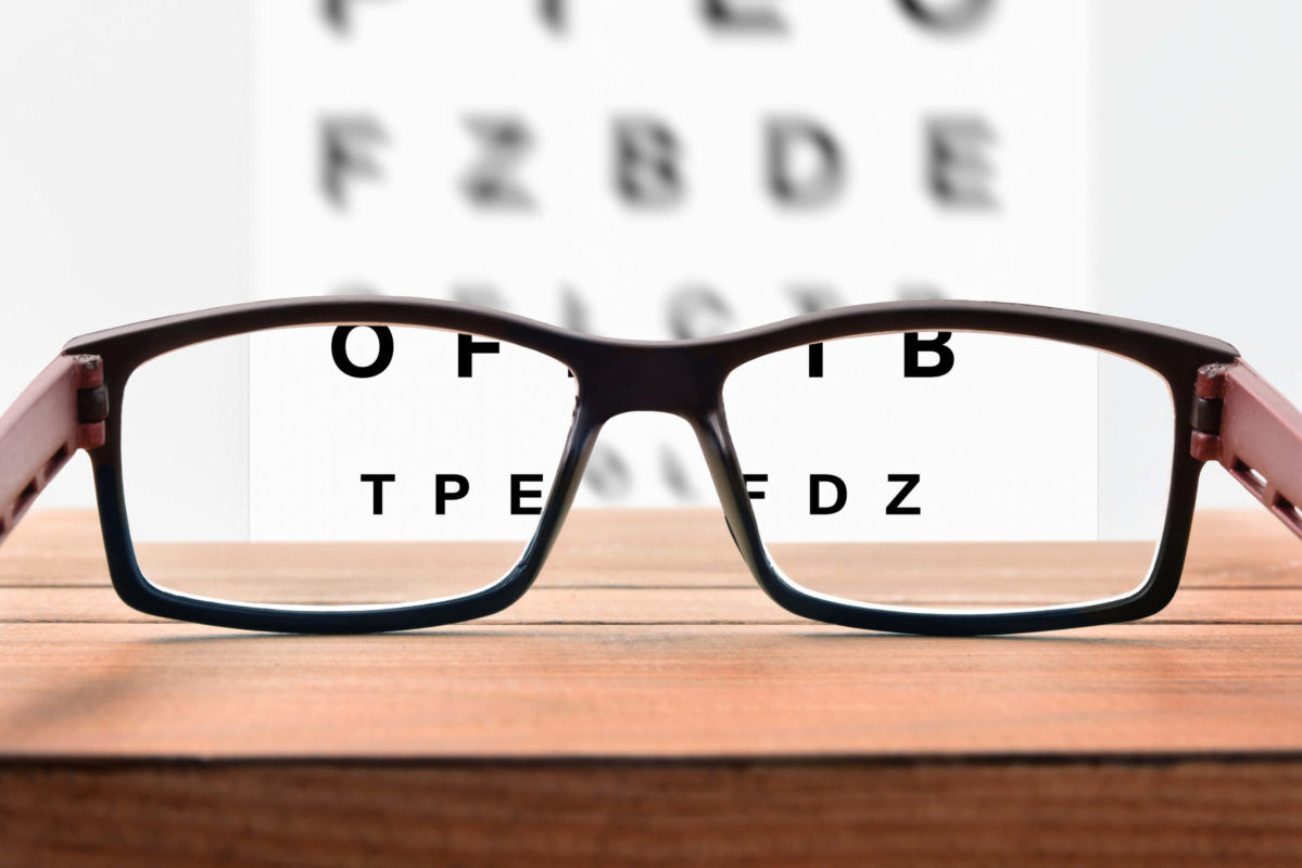 glasses that put into focus certain letters on the wall showing how to write a holiday gift guide