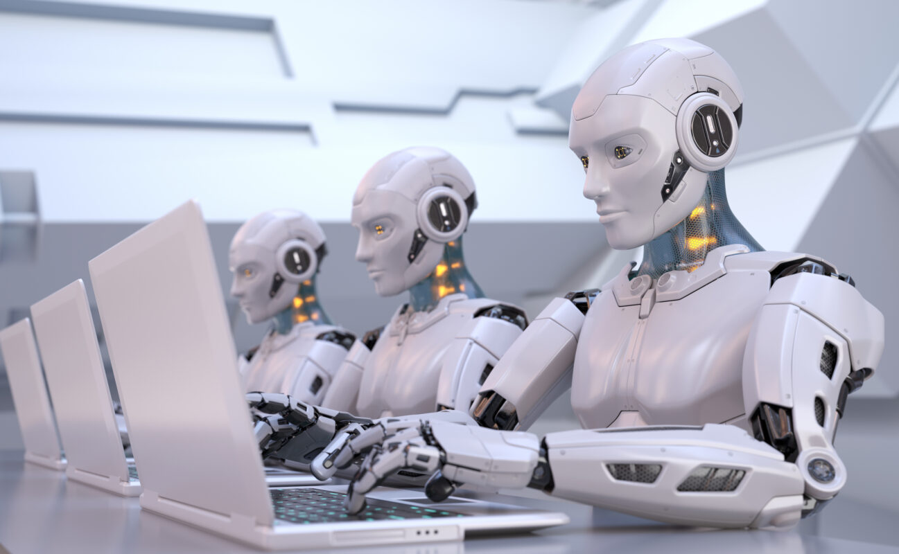 Robots sitting at desks typing on laptops symbolizing AI-generated content
